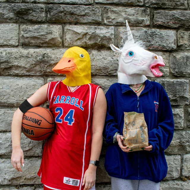 two people in sports gear with masks and head coverings standing next to each other