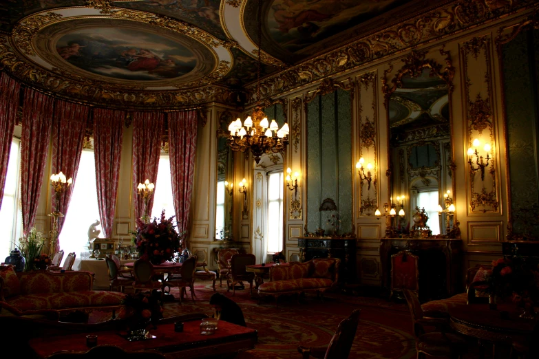 a very large and ornate fancy sitting room