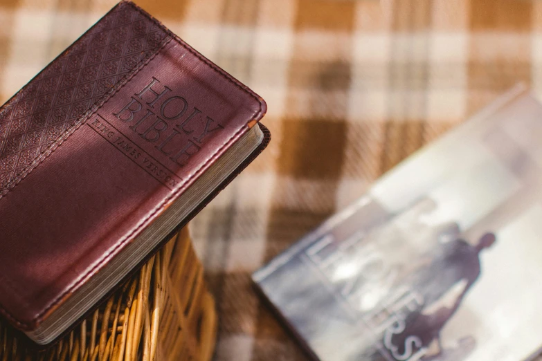 a red book sitting on top of a wooden table