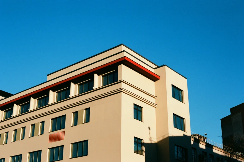 the tall beige building is empty for everyone to see