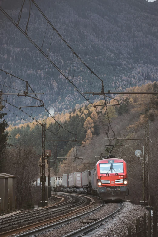 there is a train that is traveling down the tracks