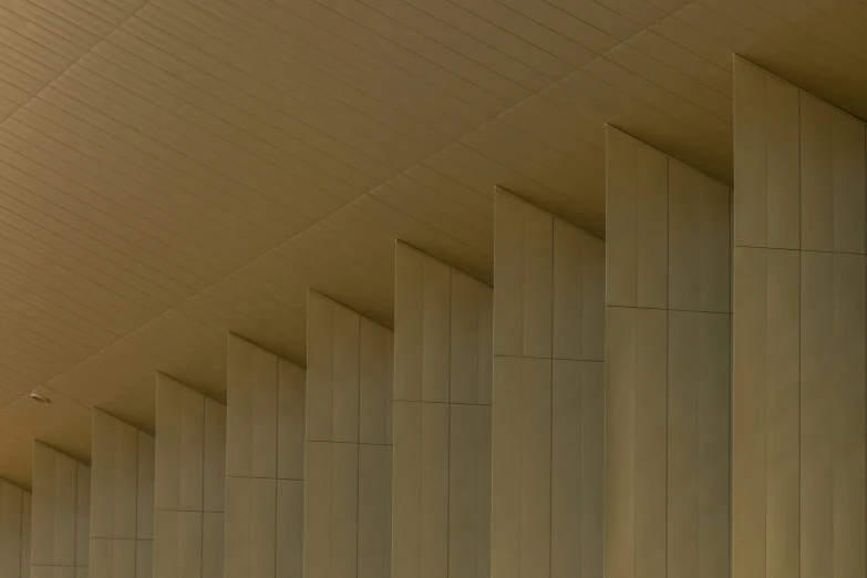 an empty walkway next to a clock tower