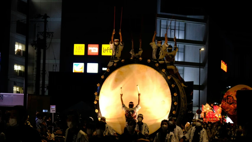 performers perform on top of an elaborate structure
