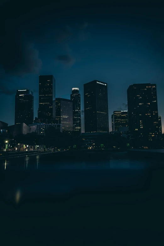 a night view of a city at the river and the lights