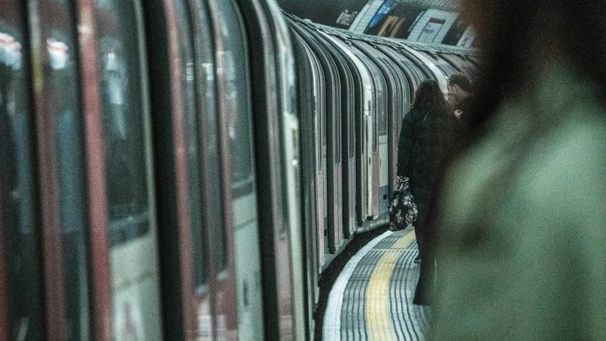 a close up s of a subway train and its tracks