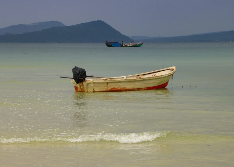 there is a boat sitting alone in the water