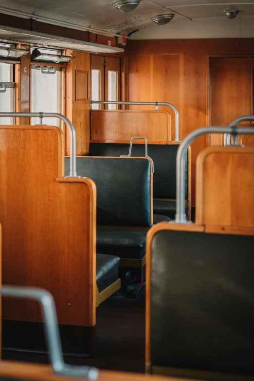 empty seats are shown on the inside of a bus