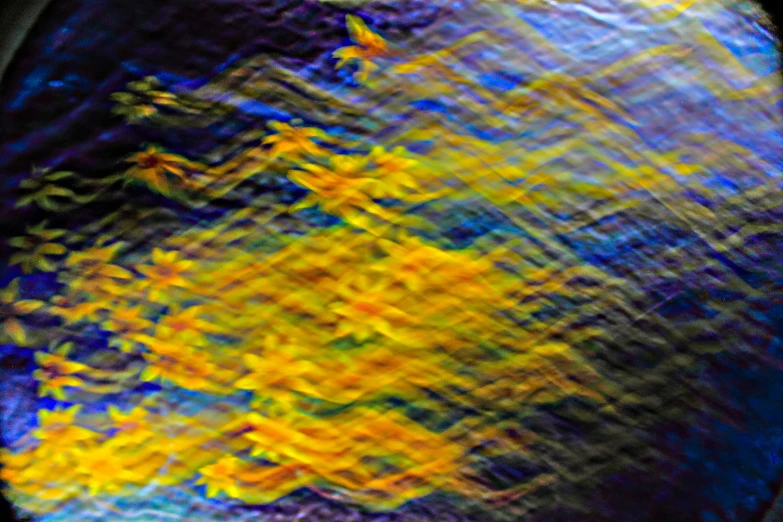 colorful yellow, orange, and purple colors on a surface