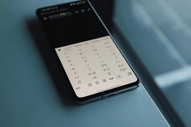 an iphone keyboard with a phone on attached to it