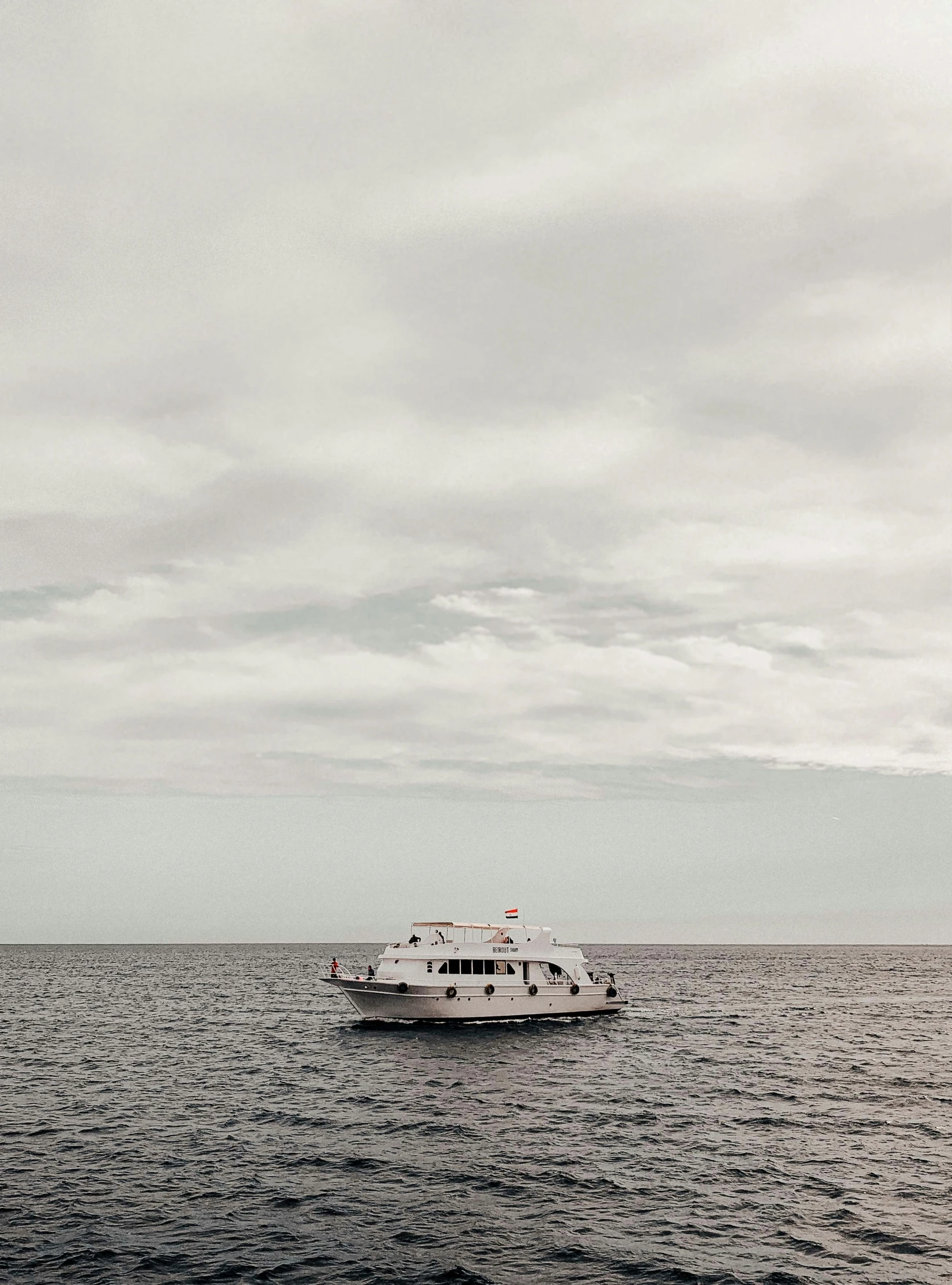 two boats that are floating in the water