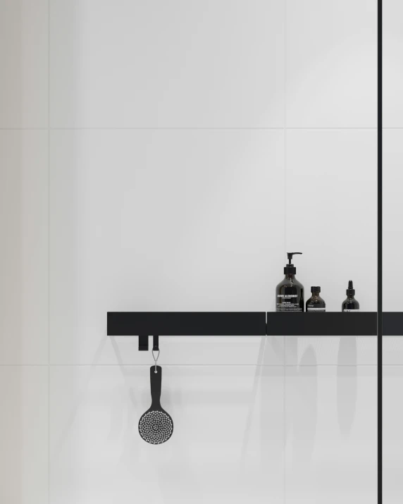 black and white wall with mirror and sink