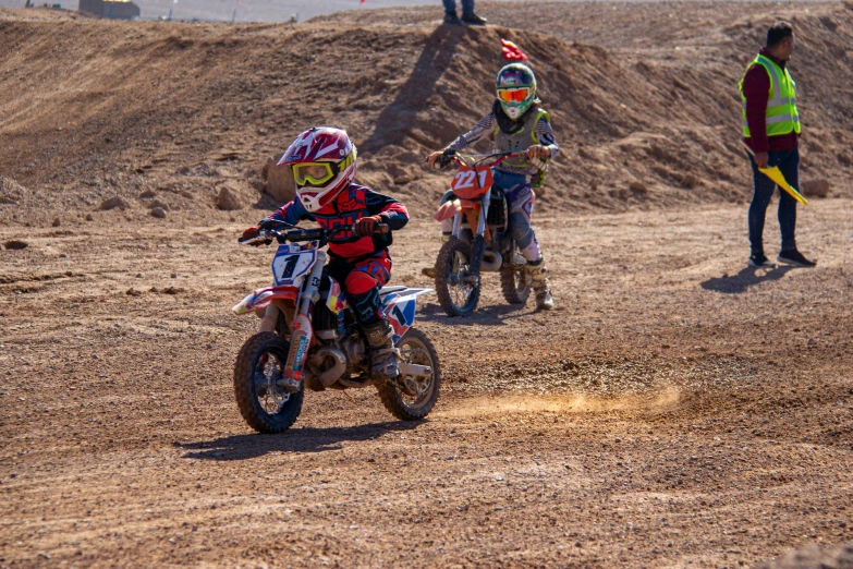 a couple of s riding on the back of motorcycles