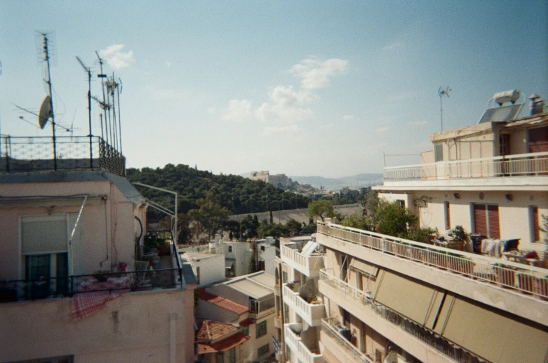 a cityscape with a building and lots of trees