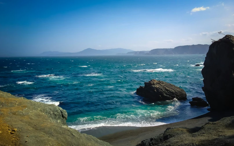 there is a large cliff over looking the water