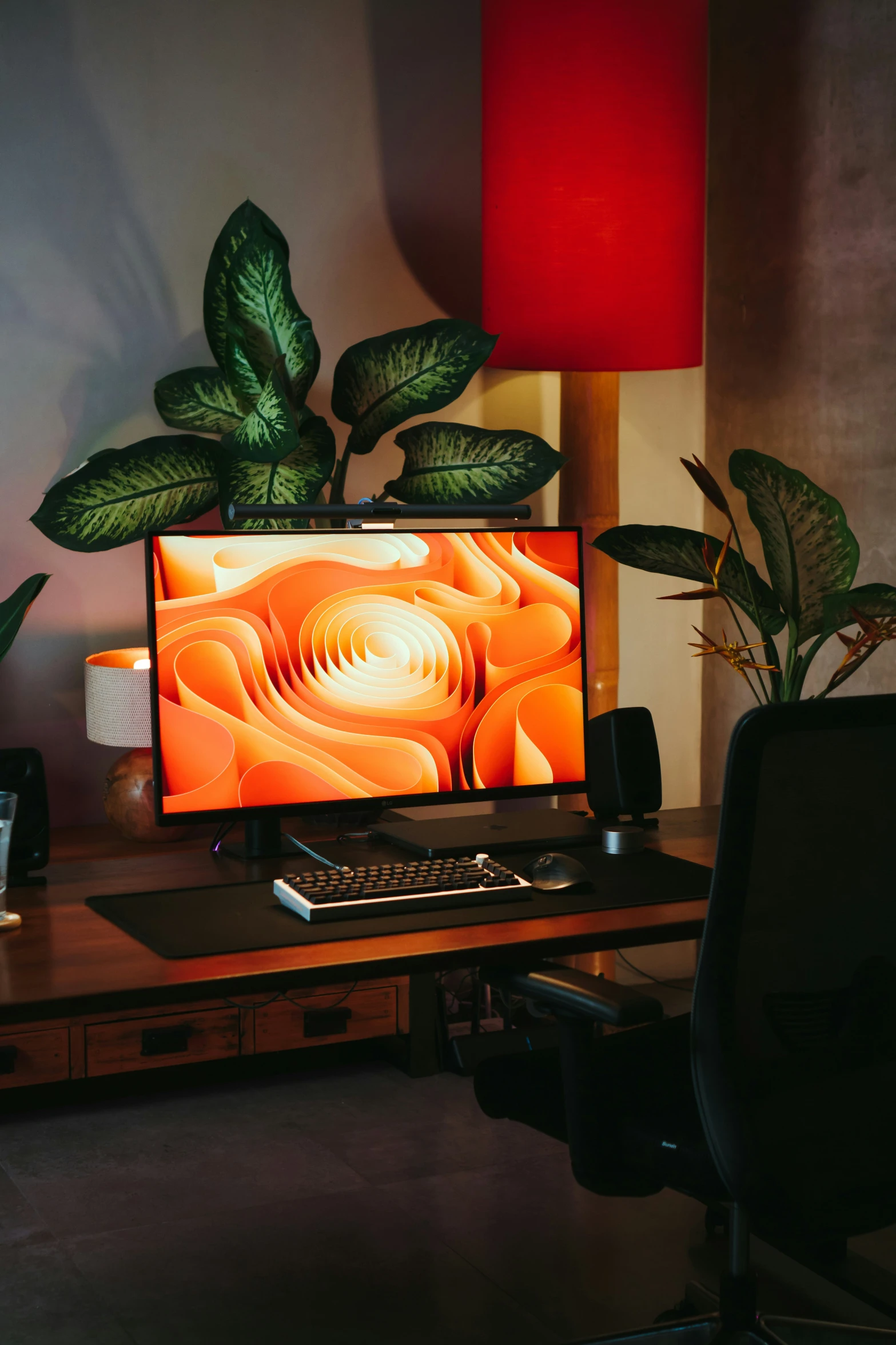 a computer sitting on top of a desk