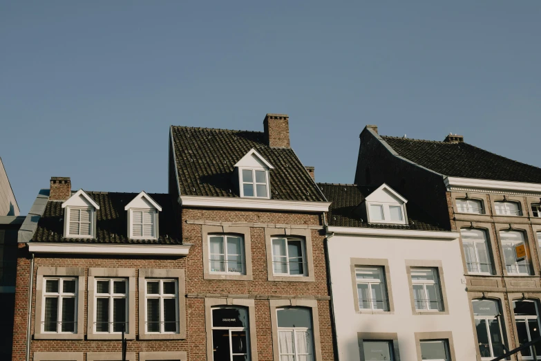 a black and white po of houses with sky