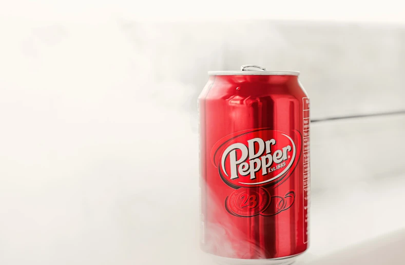 a soda is sitting on top of a counter