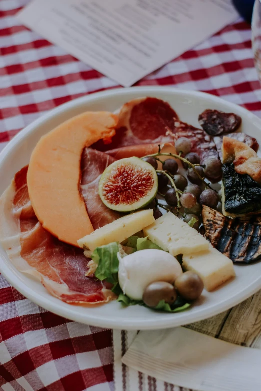 a plate filled with lots of different types of food