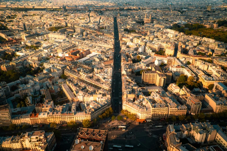 the view of the city's buildings with the eiffel tower in the background