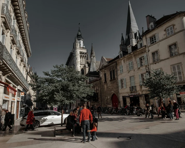 there are people walking on this street in europe