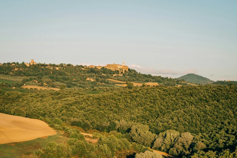 an overview of the countryside and its surrounding hills