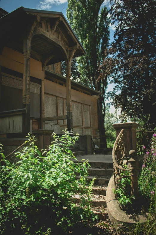 a view of an old house on a sunny day