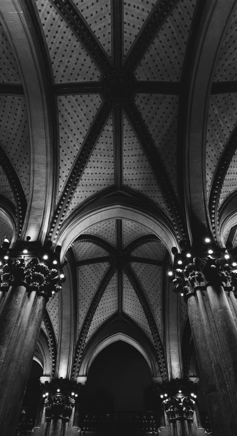 a dimly lit cathedral with ornate columns