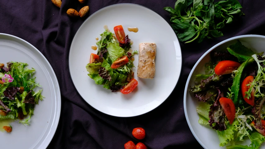 the table is lined with dishes of food