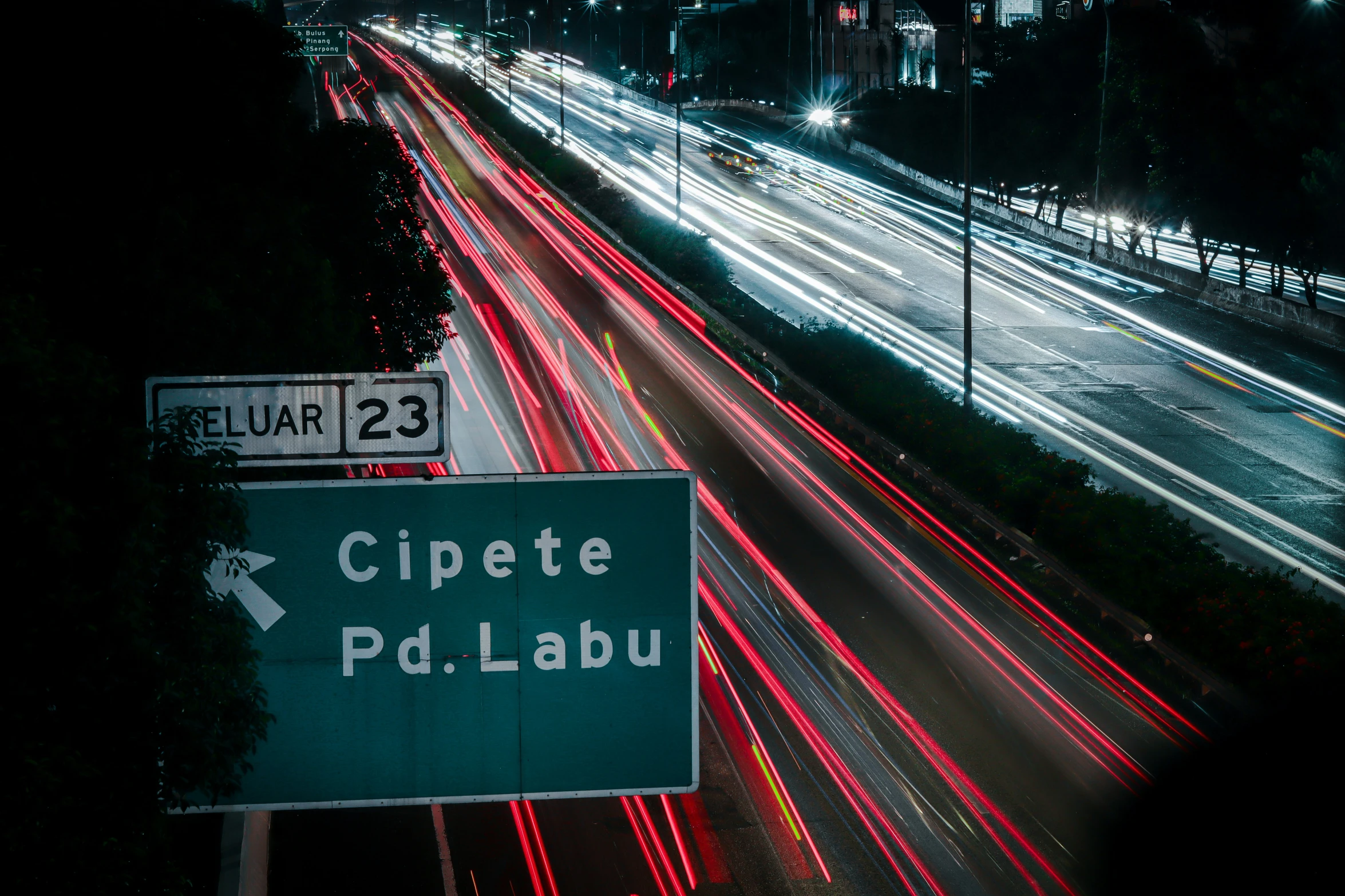 the time lapse of lights along an interstate highway