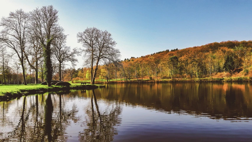 the water is calm and clear outside on the land