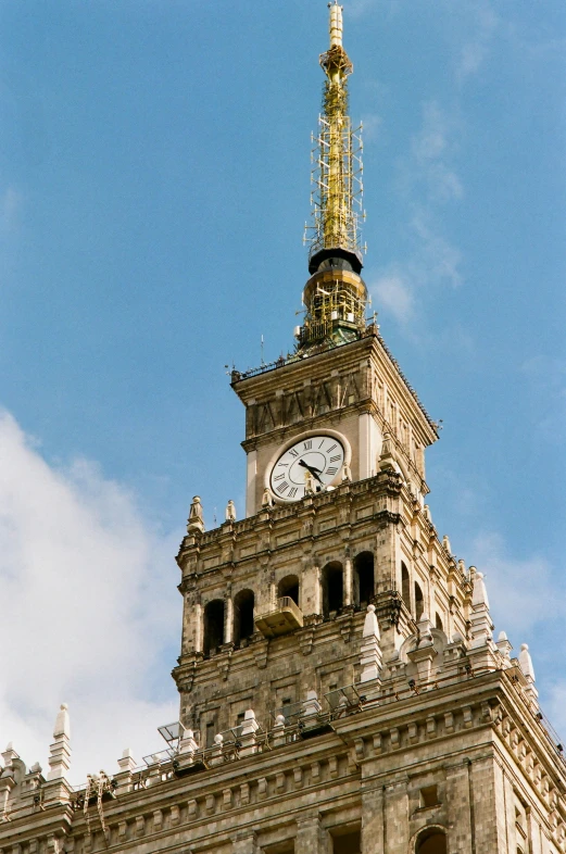 a clock that is on the side of a building