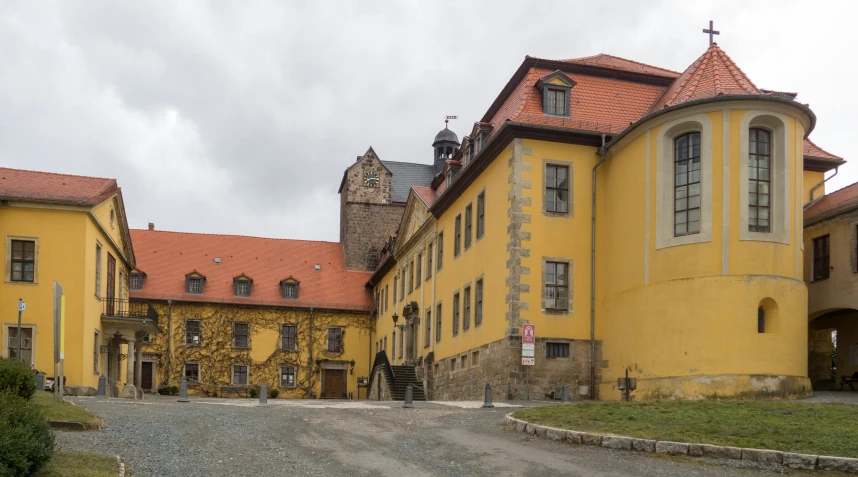 there is a very old building that has many windows and towers