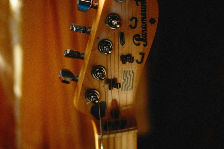 a closeup of the back of a guitar