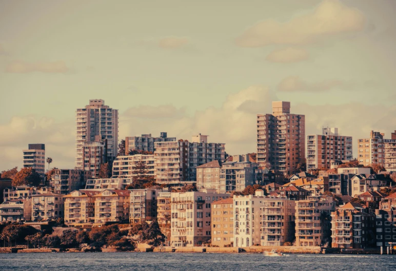 the buildings next to the water are very high rise