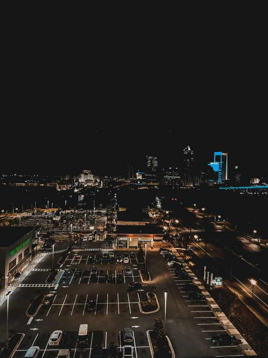 an overhead view of a parking lot at night