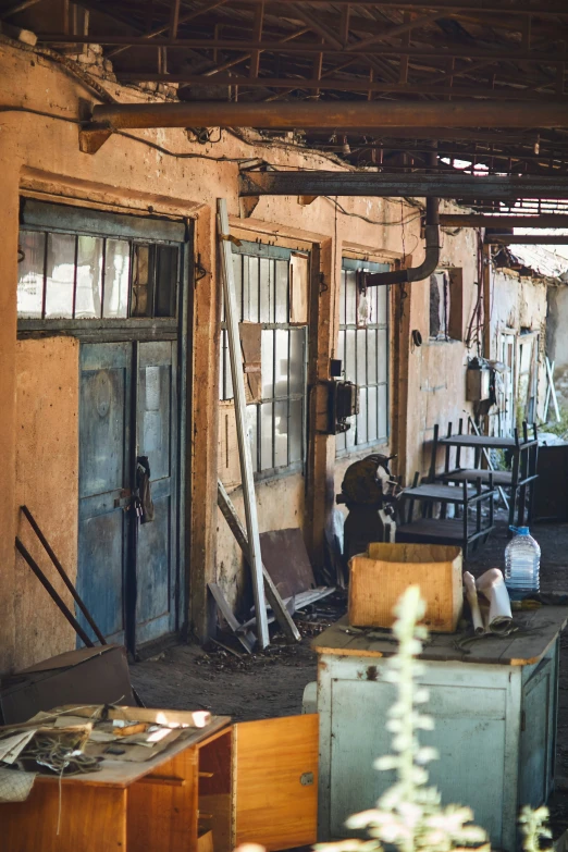 a couple of doors sitting inside of an old building