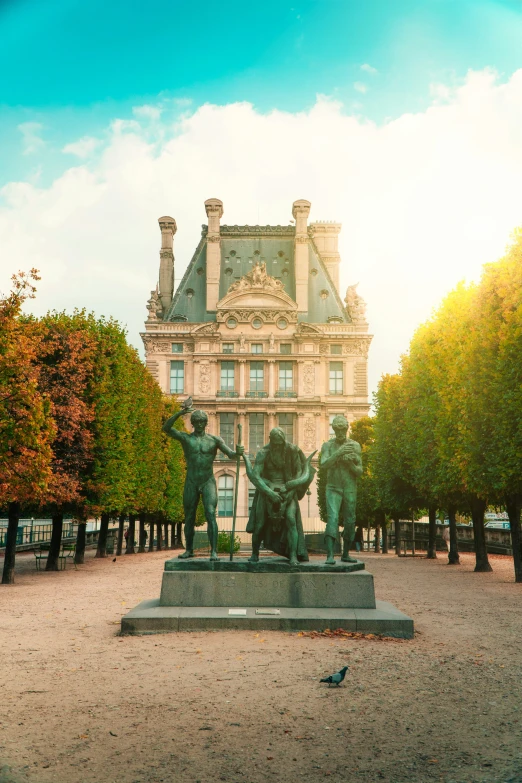 the statue in front of a castle on a sunny day