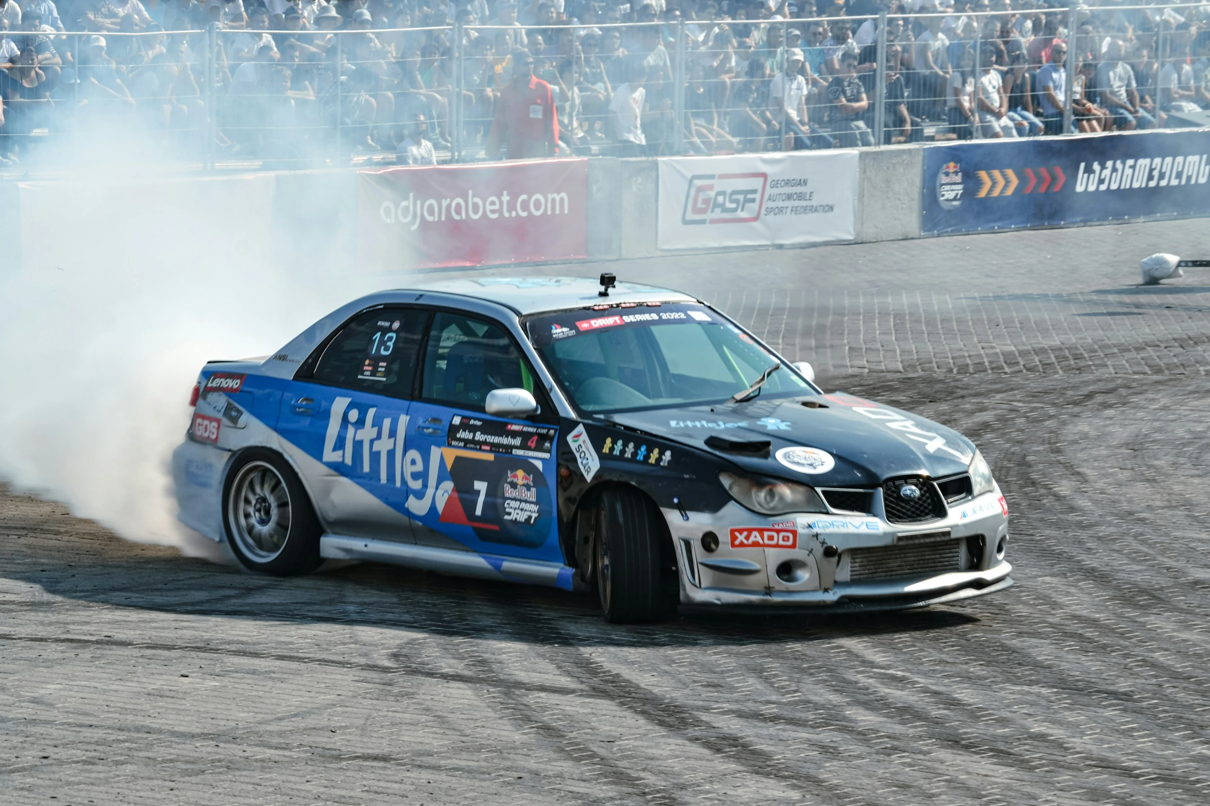 a subaruce drags the tires of another vehicle