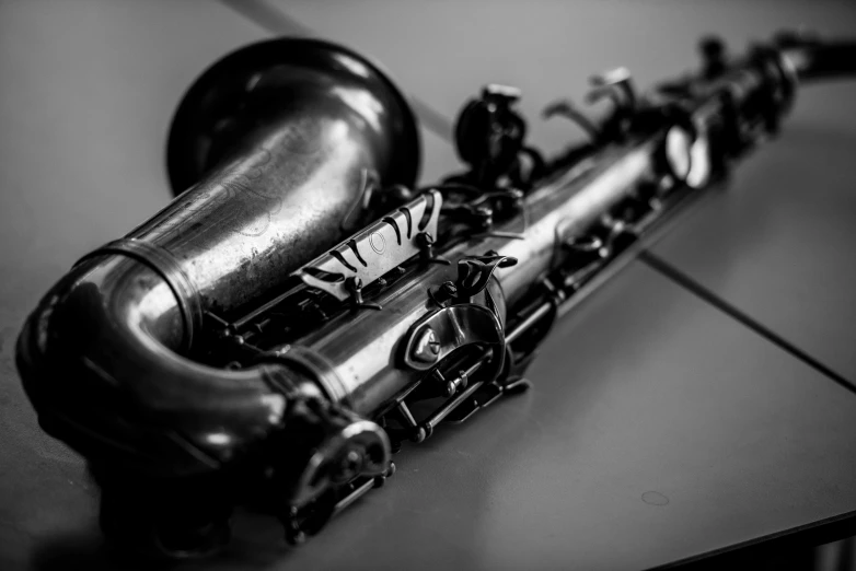 a close up image of an old saxophone