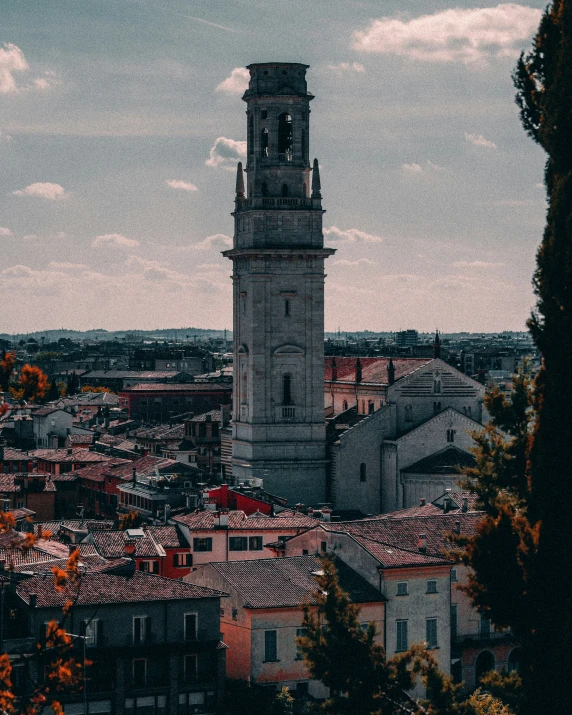 a tall tower with a clock in it's center