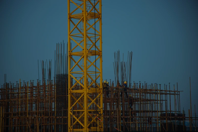 an airplane sits at the top of some construction site