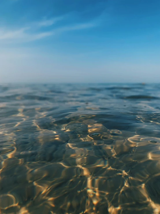 an open water surface near the ocean