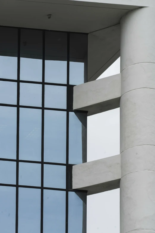 the building looks out through the glass in the windows