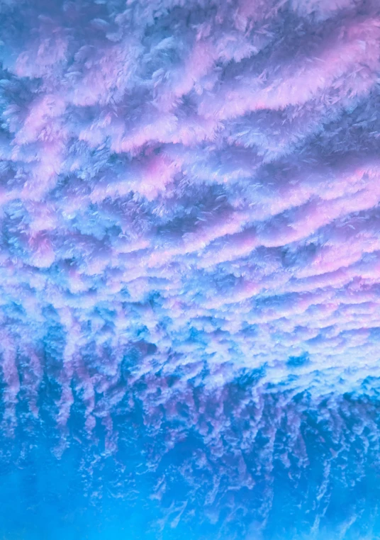 a very colorful po of clouds with purple and blue colors