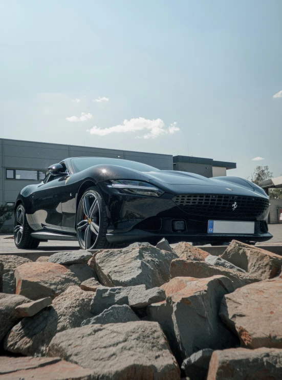 a futuristic car is parked on the side of the street