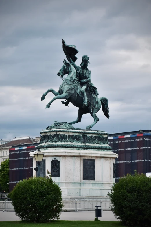 there is a statue that has a man on a horse