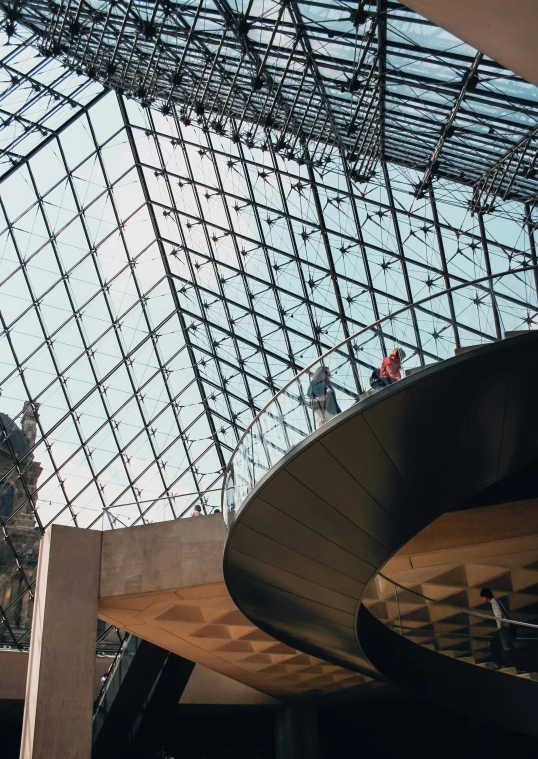 looking up at the ceiling from inside a glass structure