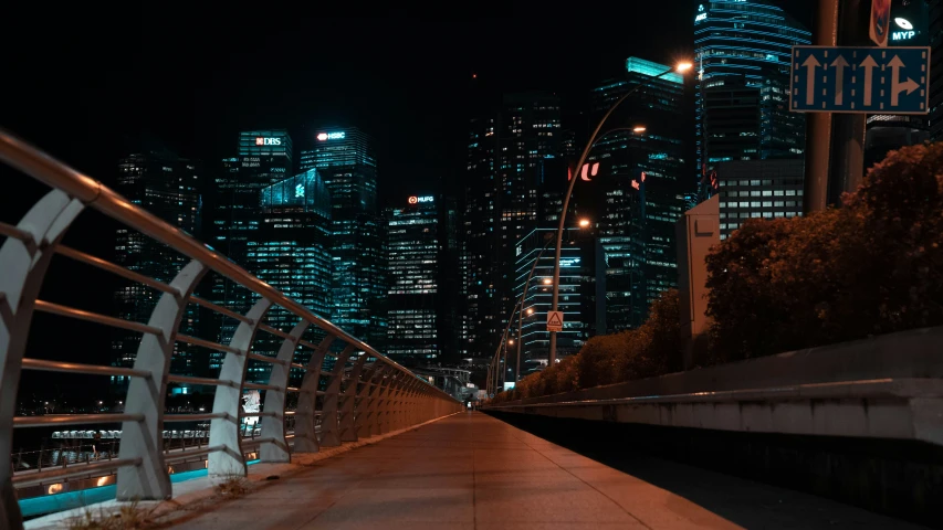 a city at night with buildings lit up