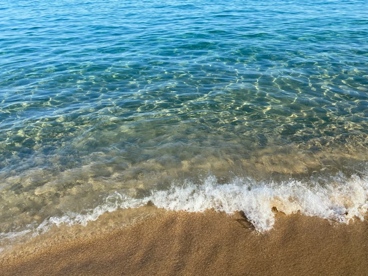 some water that has some sand on top of it