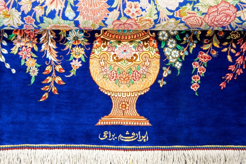 the persian style carpet is hand - made in silk